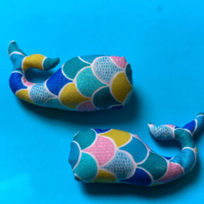 Small handmade fish rattle soft toy in colourful ocean print
