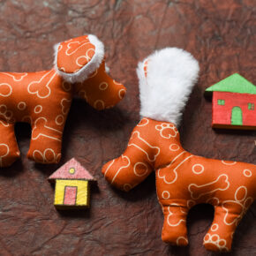 Small handmade dog rattle soft toy with furry ears