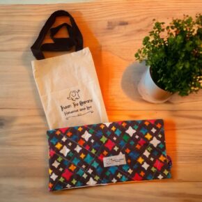 Handmade sensory activity mat and pouch set with buckles, zips, beads and laces designed for kids with special needs and people with dementia.