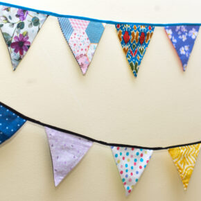 Fabric bunting banner with colourful triangle flags for party and room décor