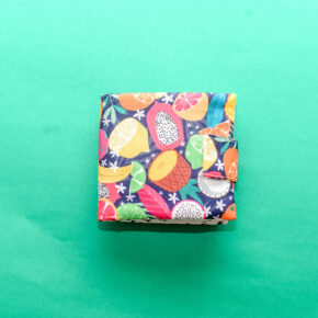 Handmade fruit sensory cloth book with cherries, pear, watermelon, pineapple, banana and apple.