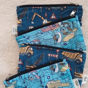 Handmade fabric pencil pouch with construction trucks and aeroplane print